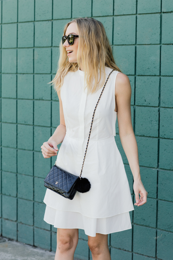 White dress and white Chanel bag