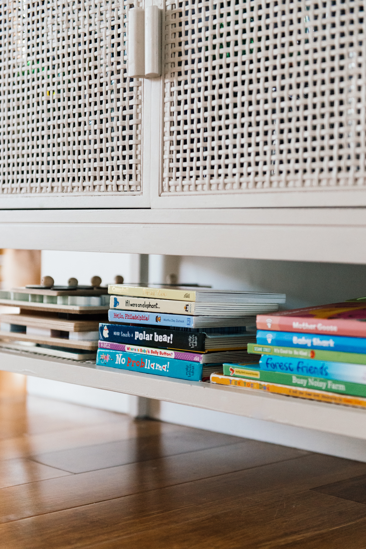 Tricks to hide your toddlers toys and books on shelves by Kimberly Lapides of eatsleepwear