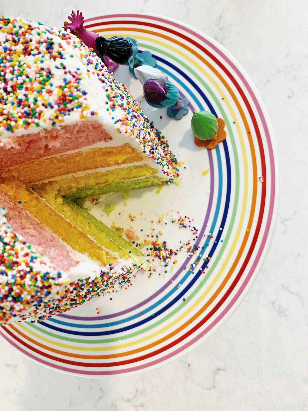 DIY Trolls theme rainbow sprinkle cake on rainbow cake stand