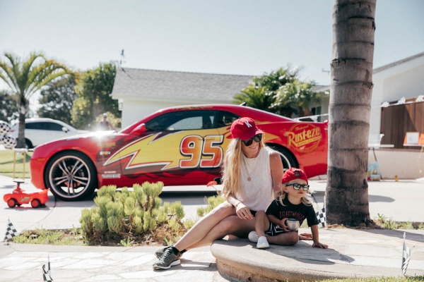 Mother and Son with Lightning McQueen Impersonator Car at Disney Pixar Cars themed birthday