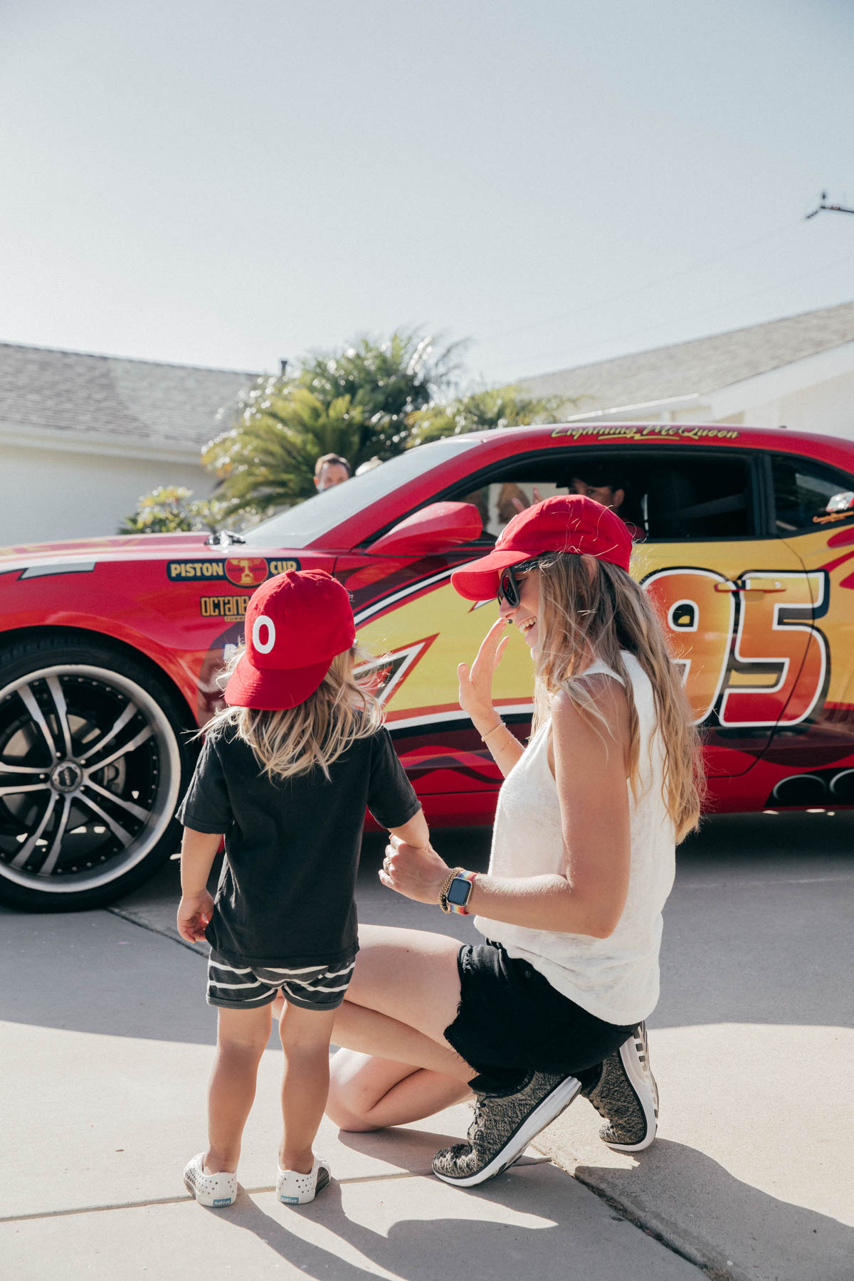 Mother and Son in front of Lightning McQueen Impersonator at Disney Pixar Cars themed birthday