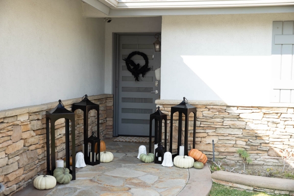 Fall & Halloween Decor For Patio & Yard with Lanterns, faux pumpkins, crow wreath and LED ghosts